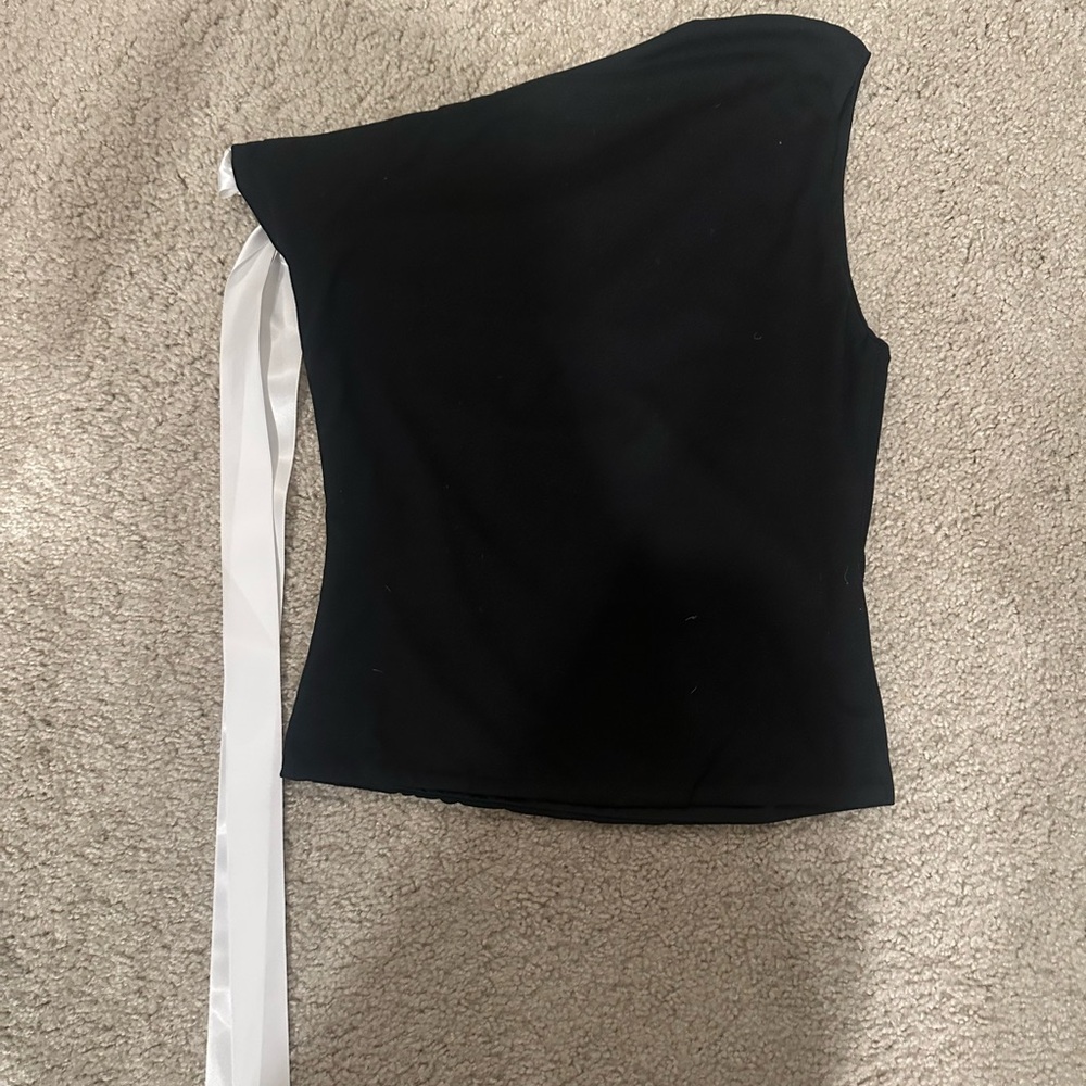 Stylish Black One-Shoulder Top with White Accent